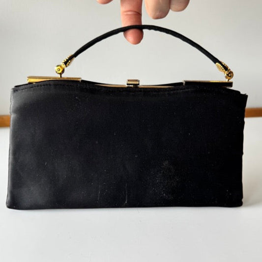 Ande Black Satin Clutch with Moving Handle