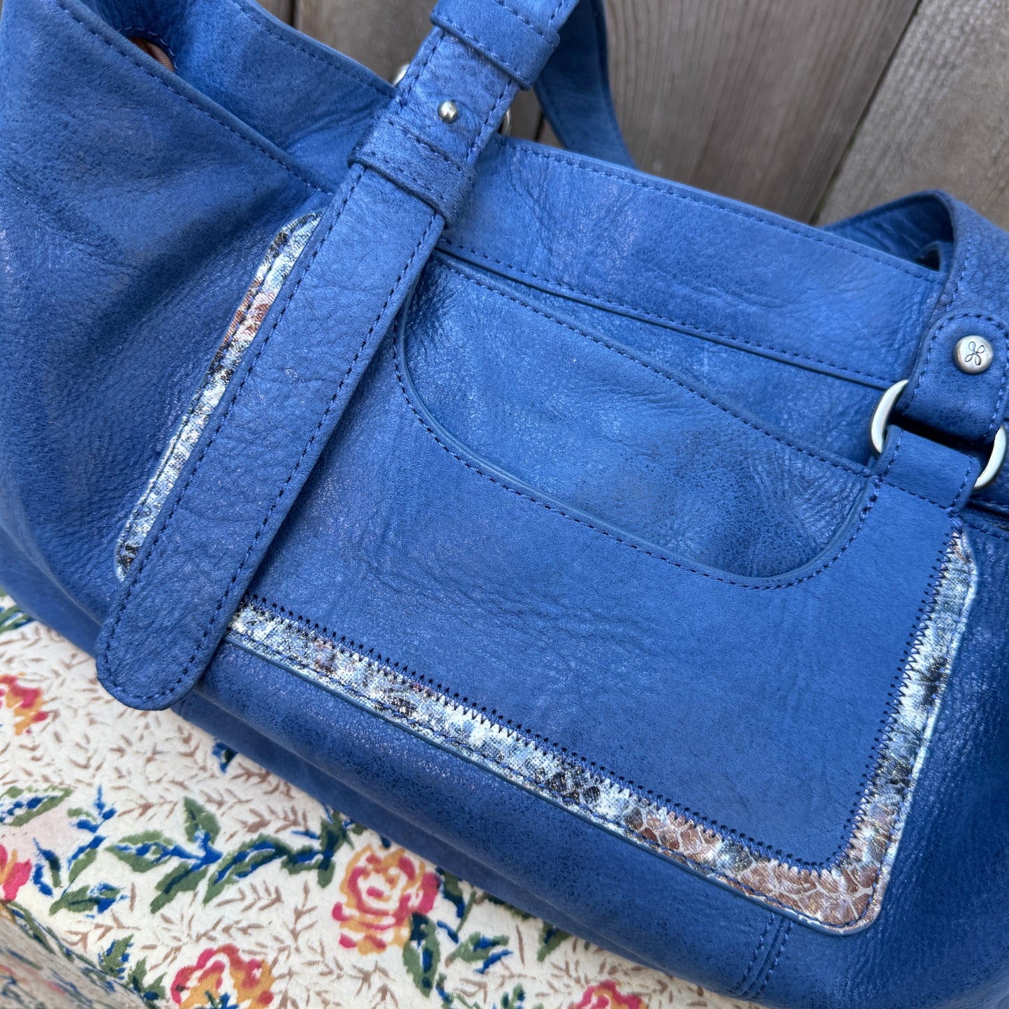 Blue Shoulder Bag with Snake Trim Detail.